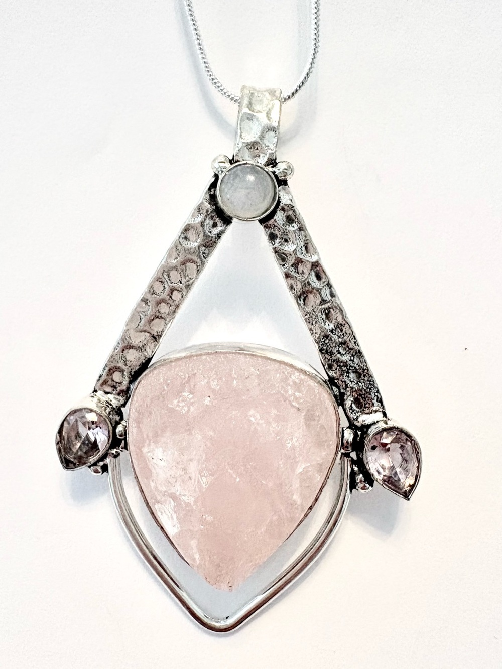 2 1/2 inch, 925 marked,, natural, rough, Rose Quartz and Pink Topaz pendant.
